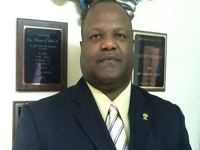 Reverend Clinton J. Hall II and Elder Postell
